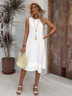 Vestido Midi Minimalista com Gola Redonda e Bainha Assimétrica - La Lecce