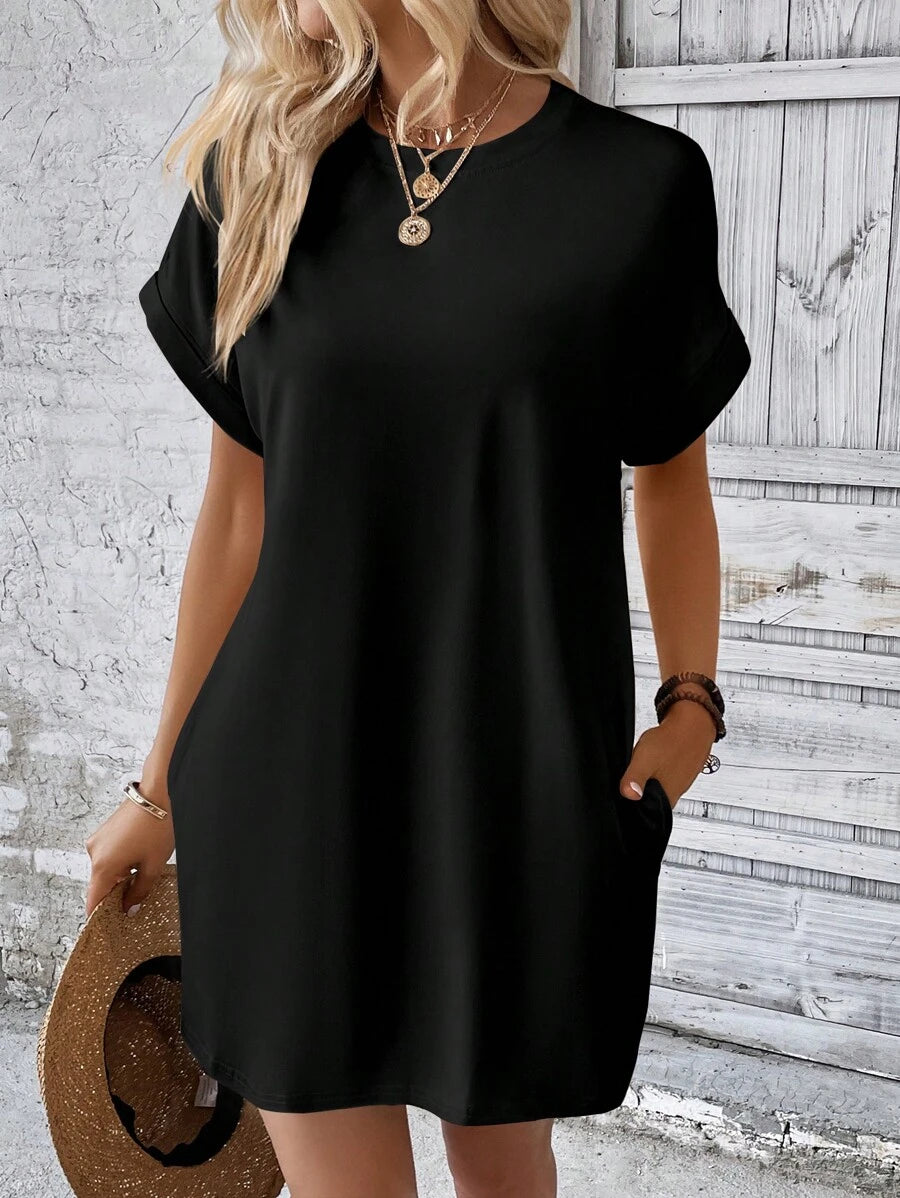 Vestido Curto Camiseta com Bolsos e Manga Morcego - La Lecce