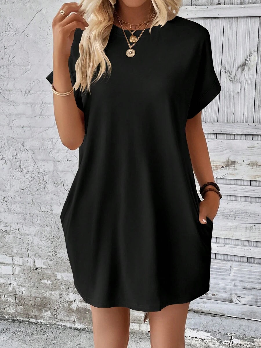 Vestido Curto Camiseta com Bolsos e Manga Morcego - La Lecce