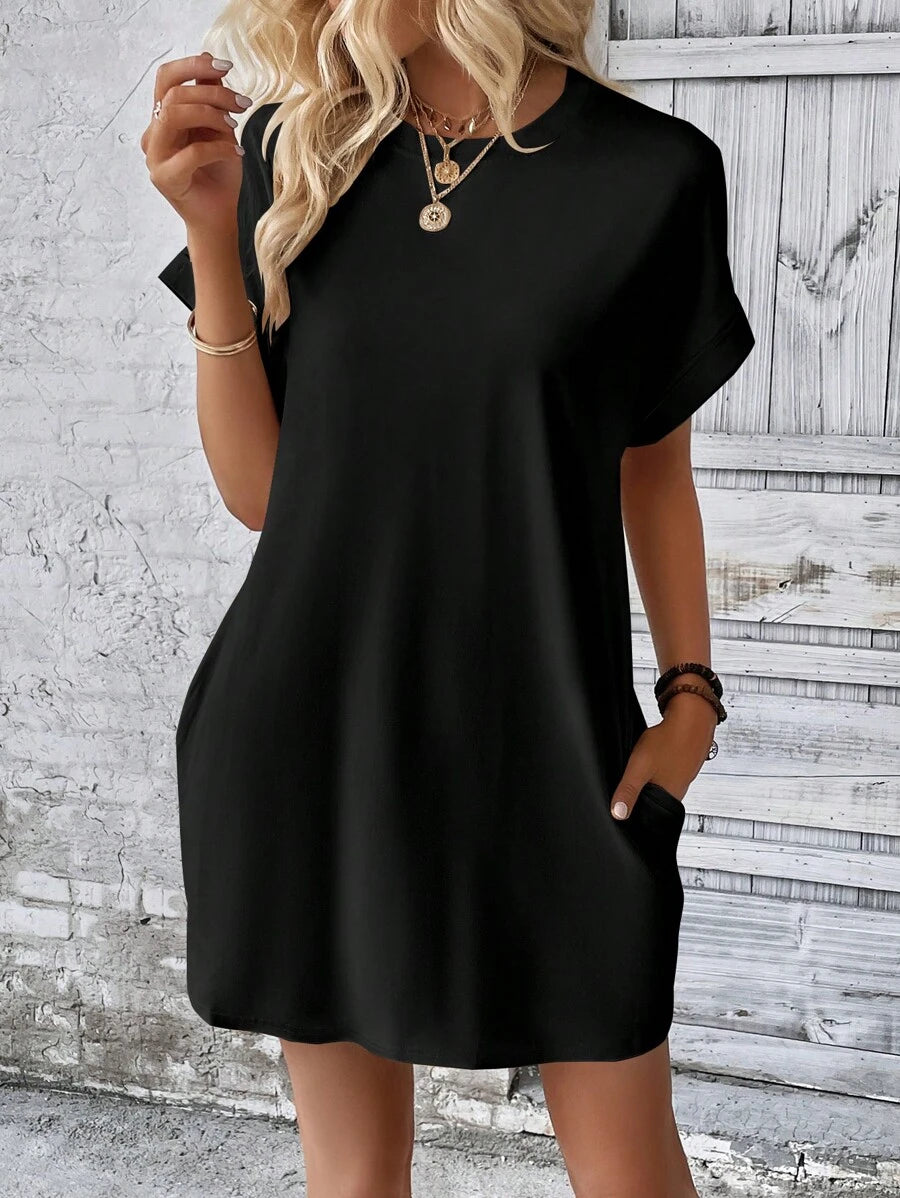Vestido Curto Camiseta com Bolsos e Manga Morcego - La Lecce