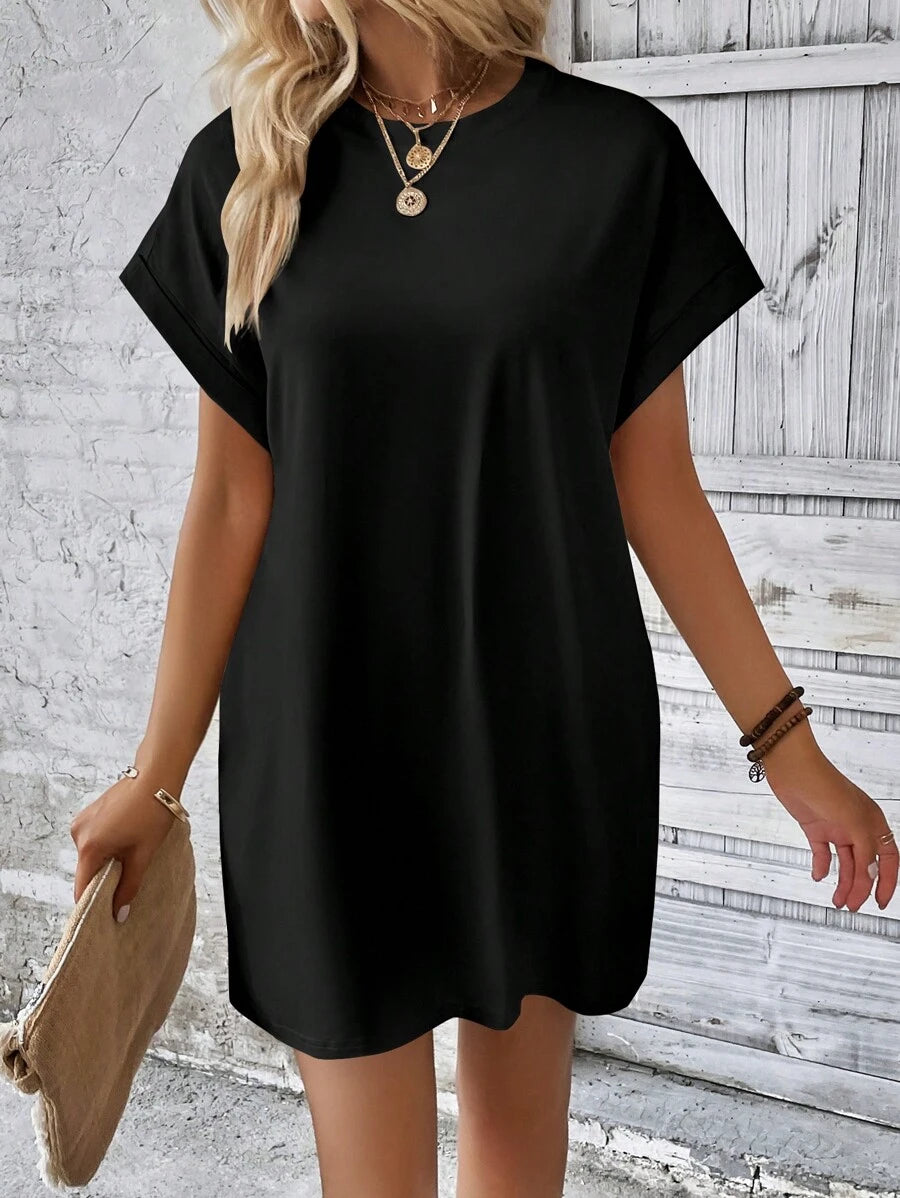 Vestido Curto Camiseta com Bolsos e Manga Morcego - La Lecce