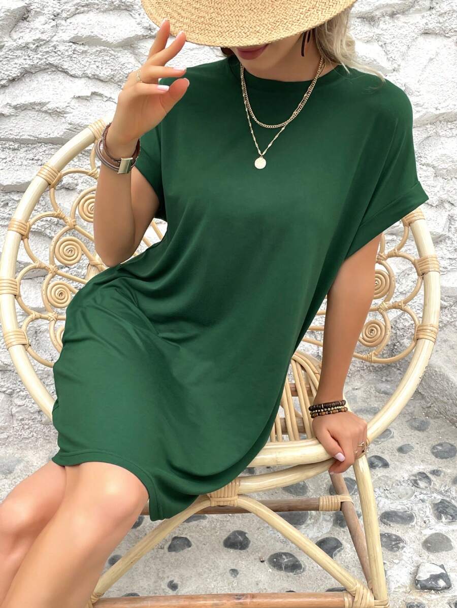Vestido Curto Camiseta com Bolsos e Manga Morcego - La Lecce