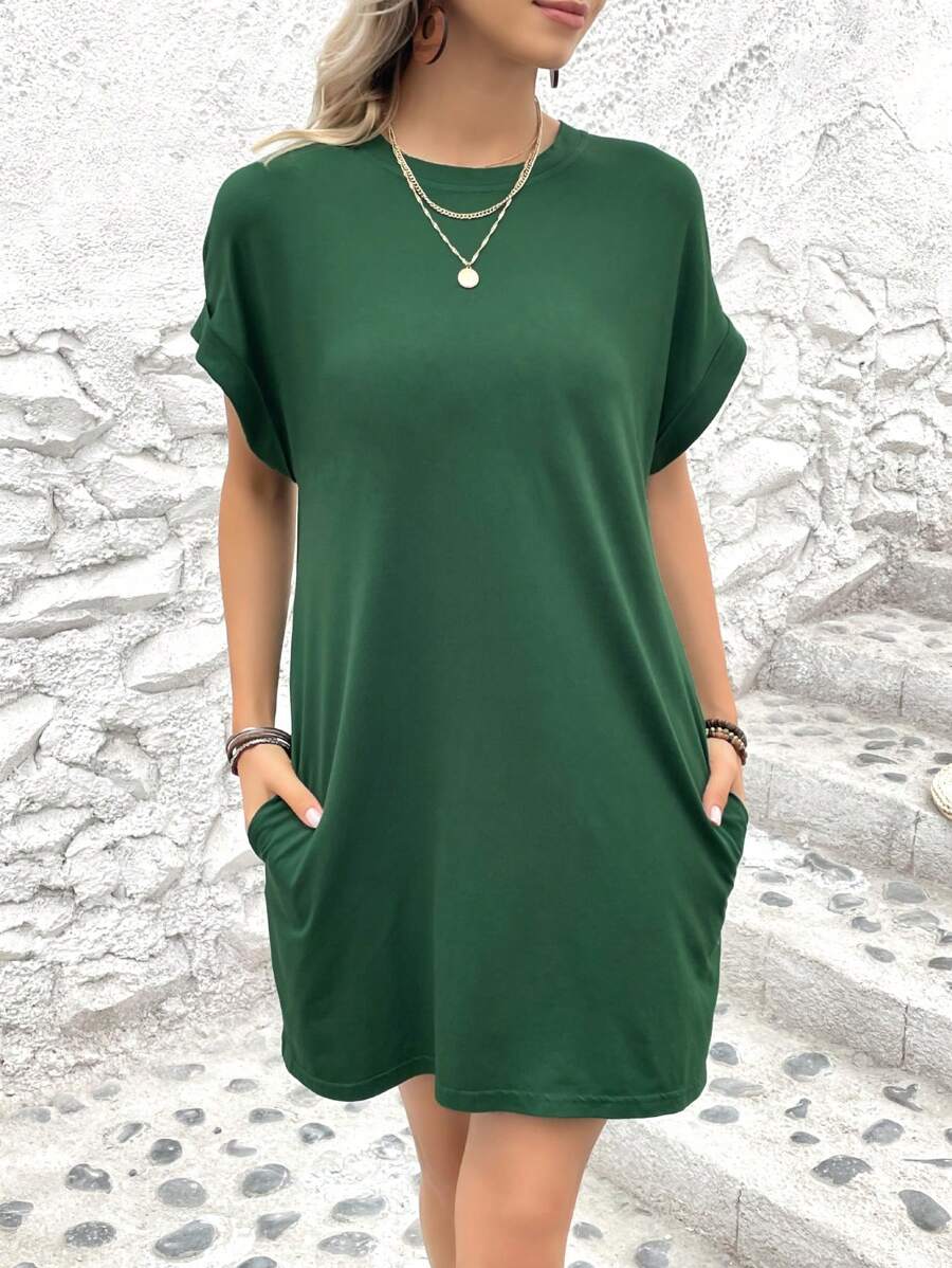 Vestido Curto Camiseta com Bolsos e Manga Morcego - La Lecce