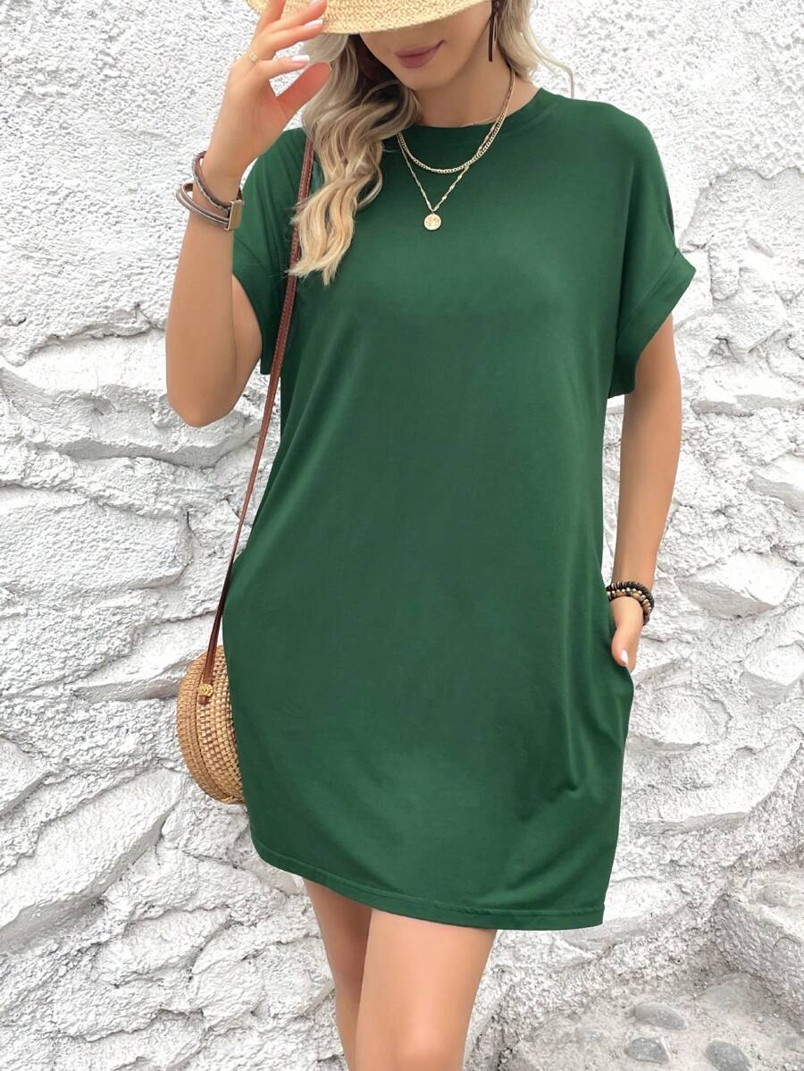 Vestido Curto Camiseta com Bolsos e Manga Morcego - La Lecce