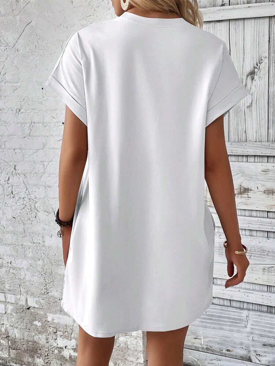 Vestido Curto Camiseta com Bolsos e Manga Morcego - La Lecce