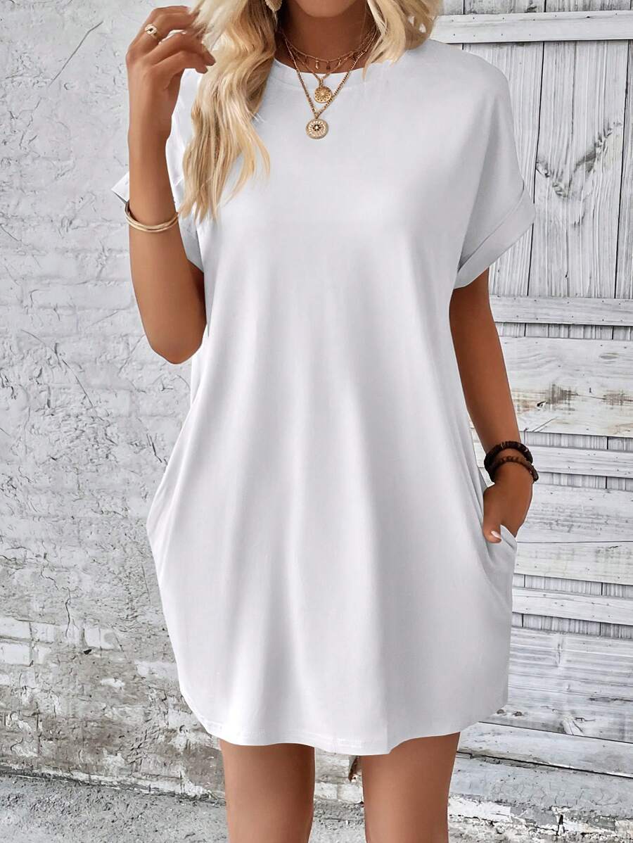 Vestido Curto Camiseta com Bolsos e Manga Morcego - La Lecce