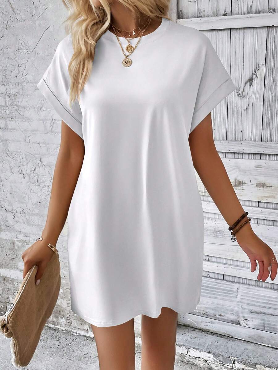 Vestido Curto Camiseta com Bolsos e Manga Morcego - La Lecce