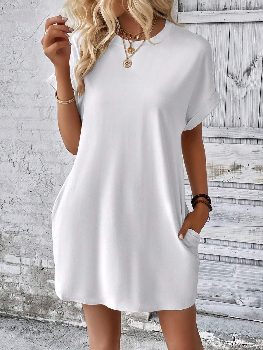 Vestido Curto Camiseta com Bolsos e Manga Morcego - La Lecce