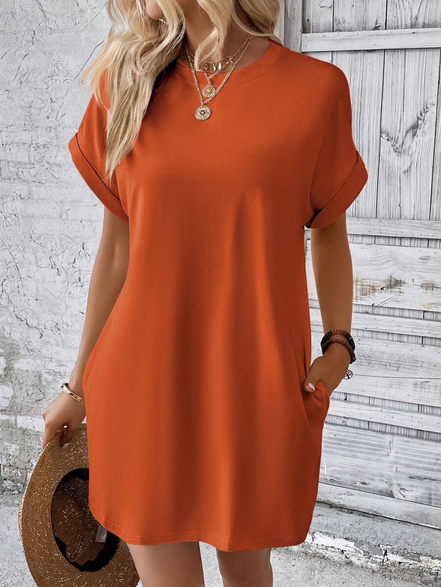 Vestido Curto Camiseta com Bolsos e Manga Morcego - La Lecce