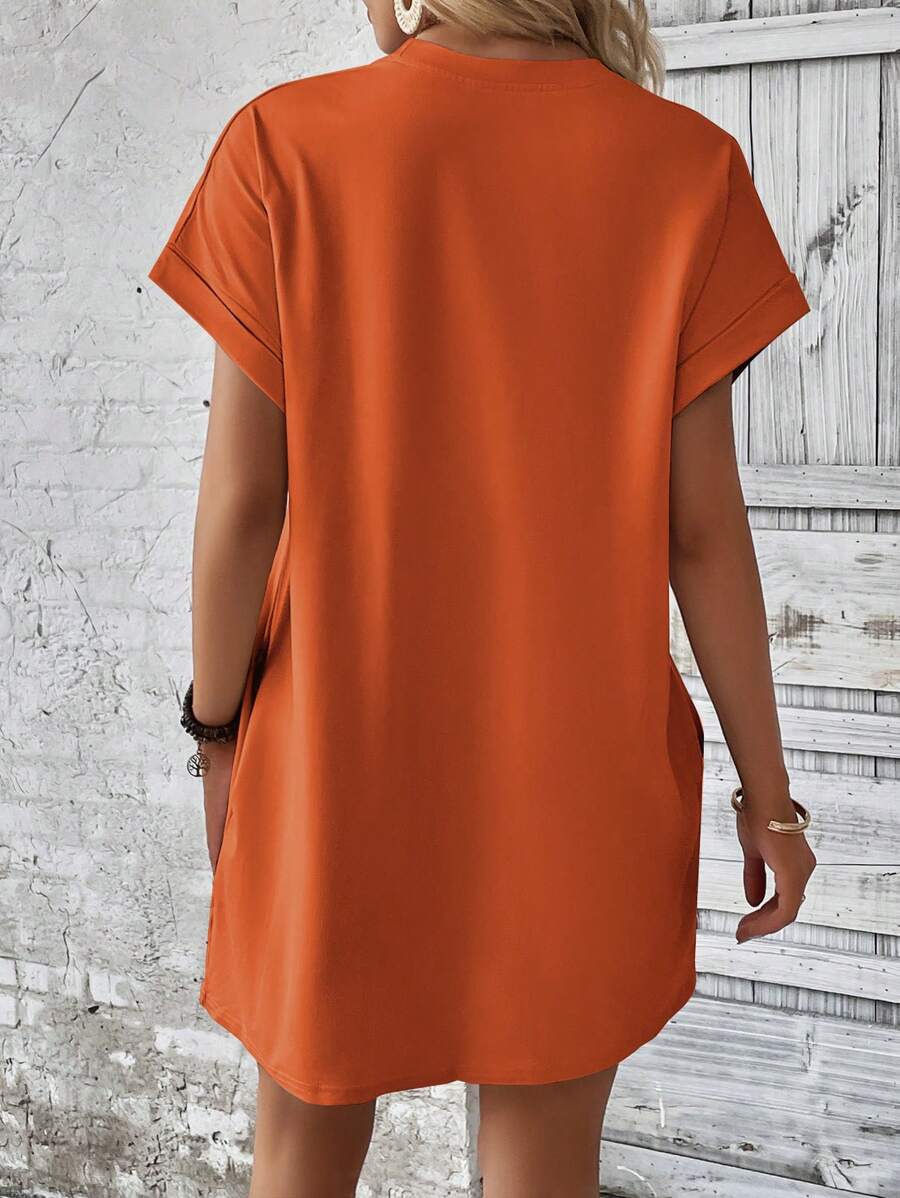 Vestido Curto Camiseta com Bolsos e Manga Morcego - La Lecce