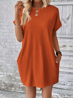 Vestido Curto Camiseta com Bolsos e Manga Morcego - La Lecce