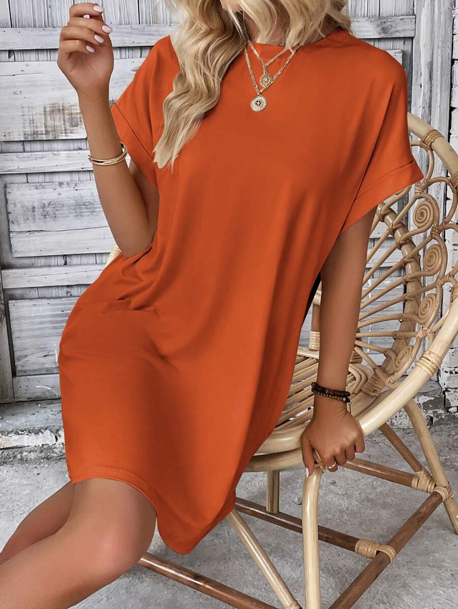 Vestido Curto Camiseta com Bolsos e Manga Morcego - La Lecce