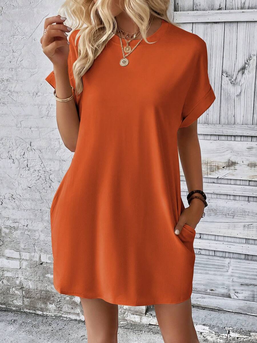 Vestido Curto Camiseta com Bolsos e Manga Morcego - La Lecce