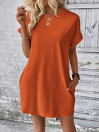Vestido Curto Camiseta com Bolsos e Manga Morcego - La Lecce