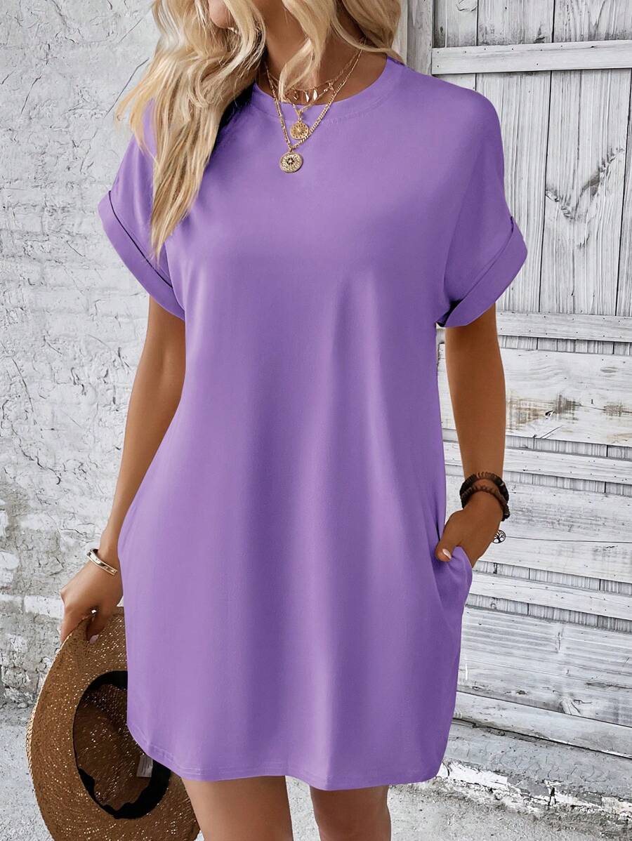 Vestido Curto Camiseta com Bolsos e Manga Morcego - La Lecce