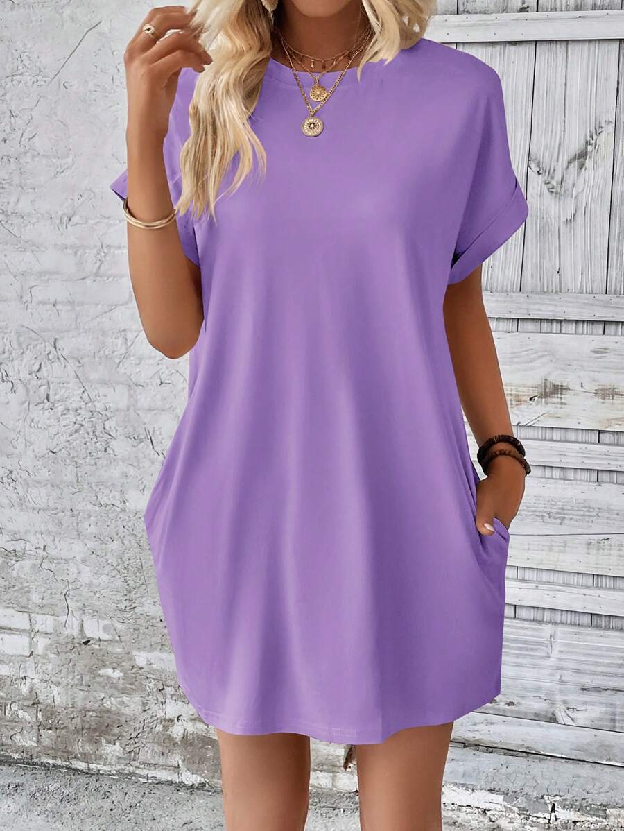 Vestido Curto Camiseta com Bolsos e Manga Morcego - La Lecce