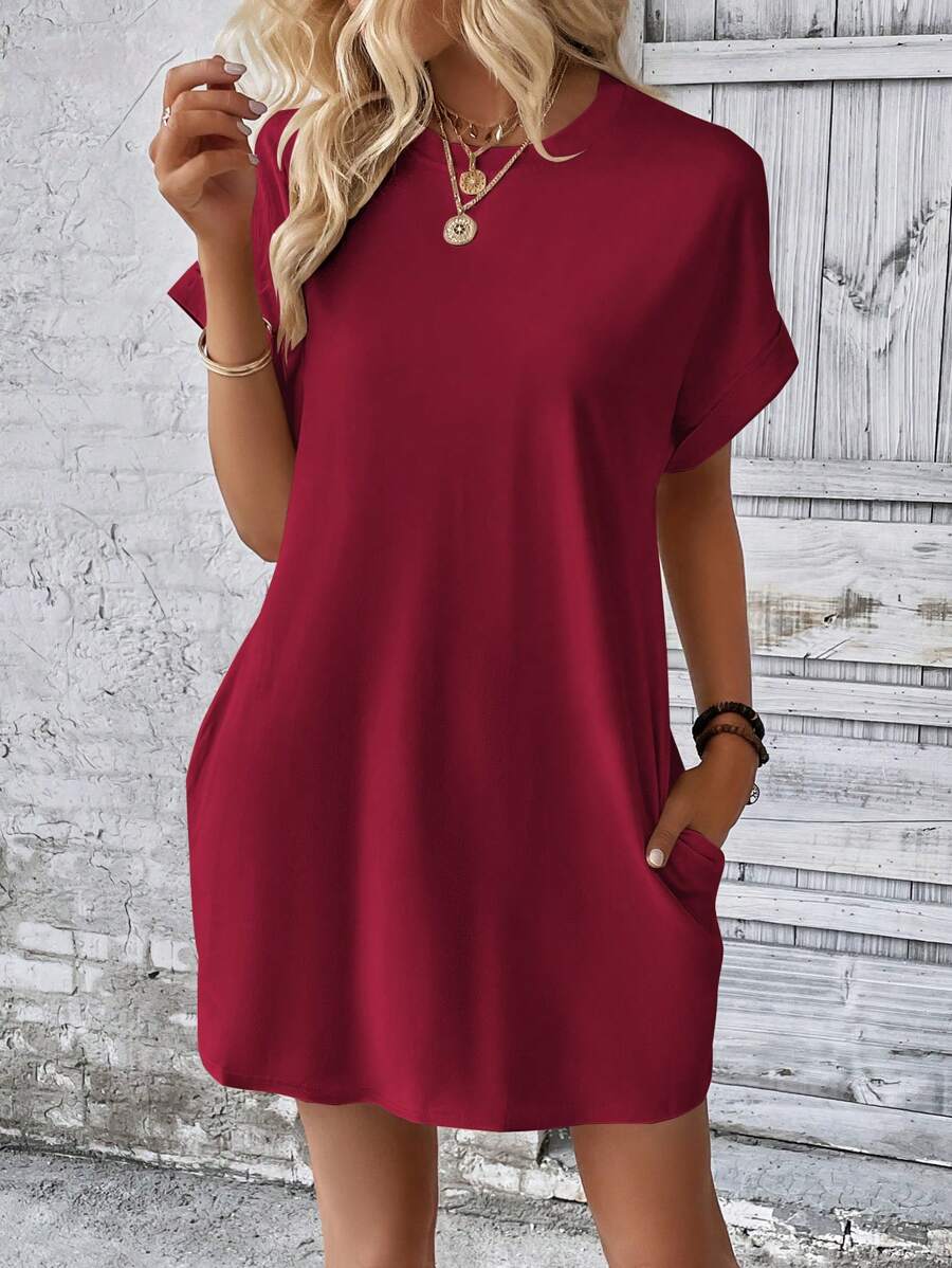 Vestido Curto Camiseta com Bolsos e Manga Morcego - La Lecce