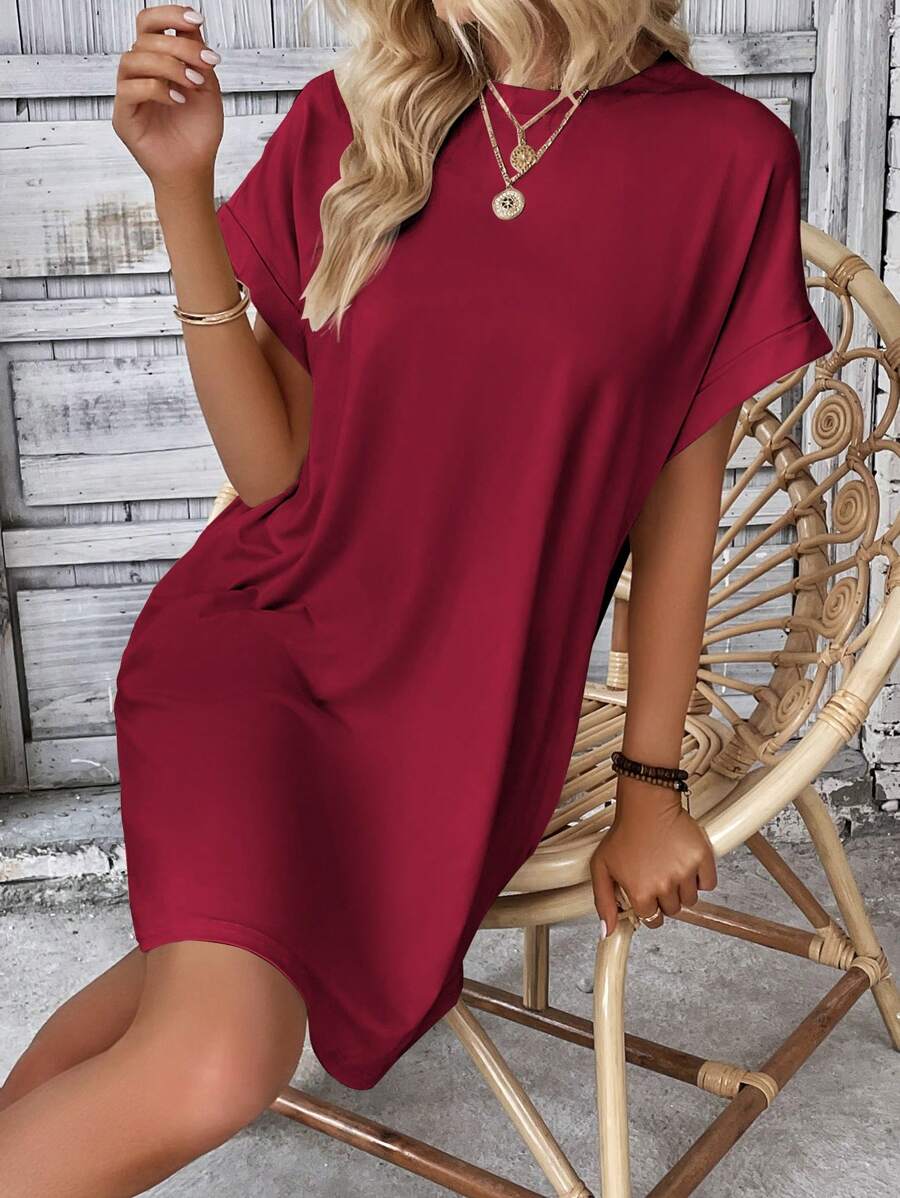 Vestido Curto Camiseta com Bolsos e Manga Morcego - La Lecce