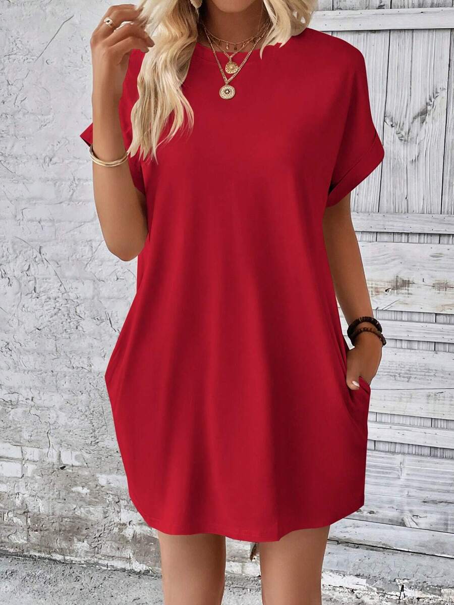 Vestido Curto Camiseta com Bolsos e Manga Morcego - La Lecce