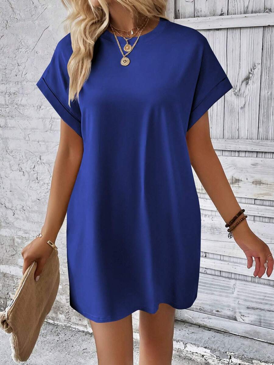 Vestido Curto Camiseta com Bolsos e Manga Morcego - La Lecce