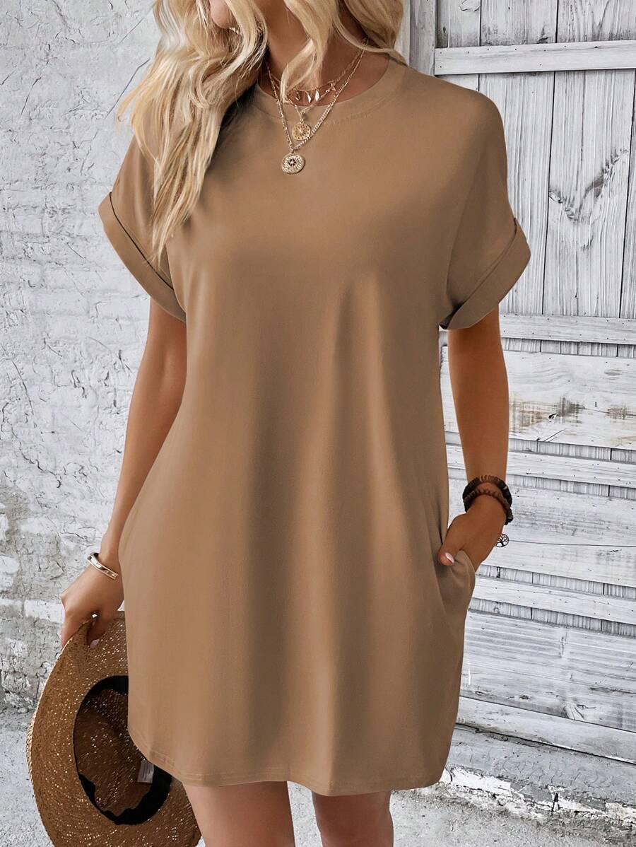 Vestido Curto Camiseta com Bolsos e Manga Morcego - La Lecce