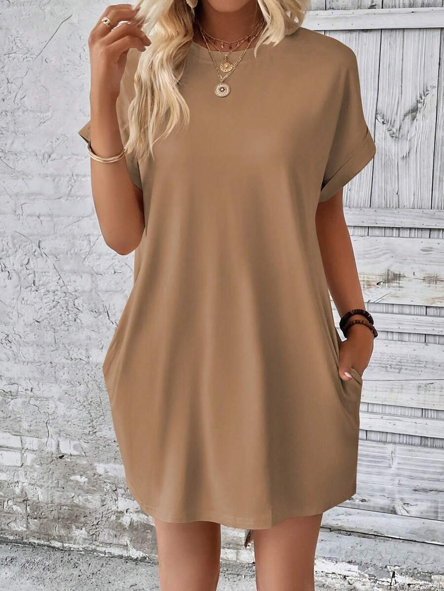 Vestido Curto Camiseta com Bolsos e Manga Morcego - La Lecce