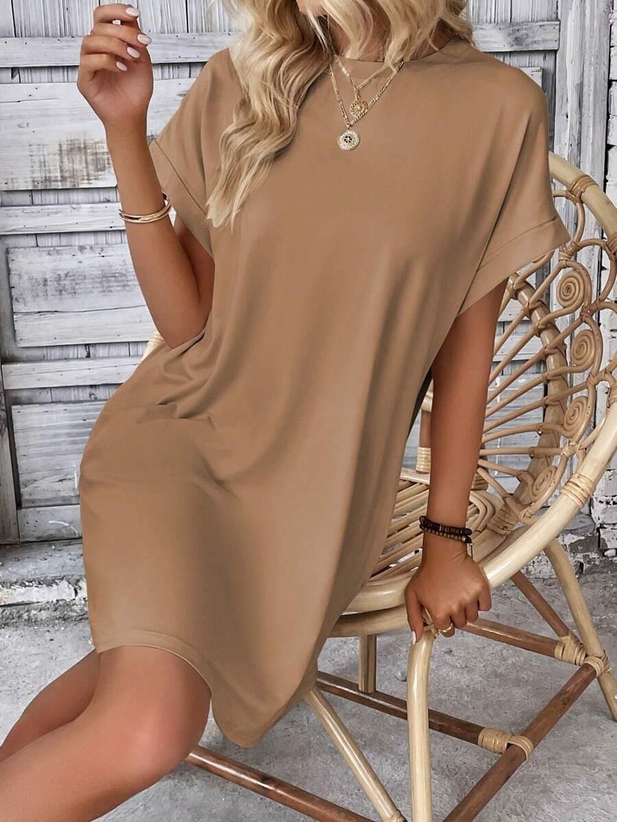 Vestido Curto Camiseta com Bolsos e Manga Morcego - La Lecce