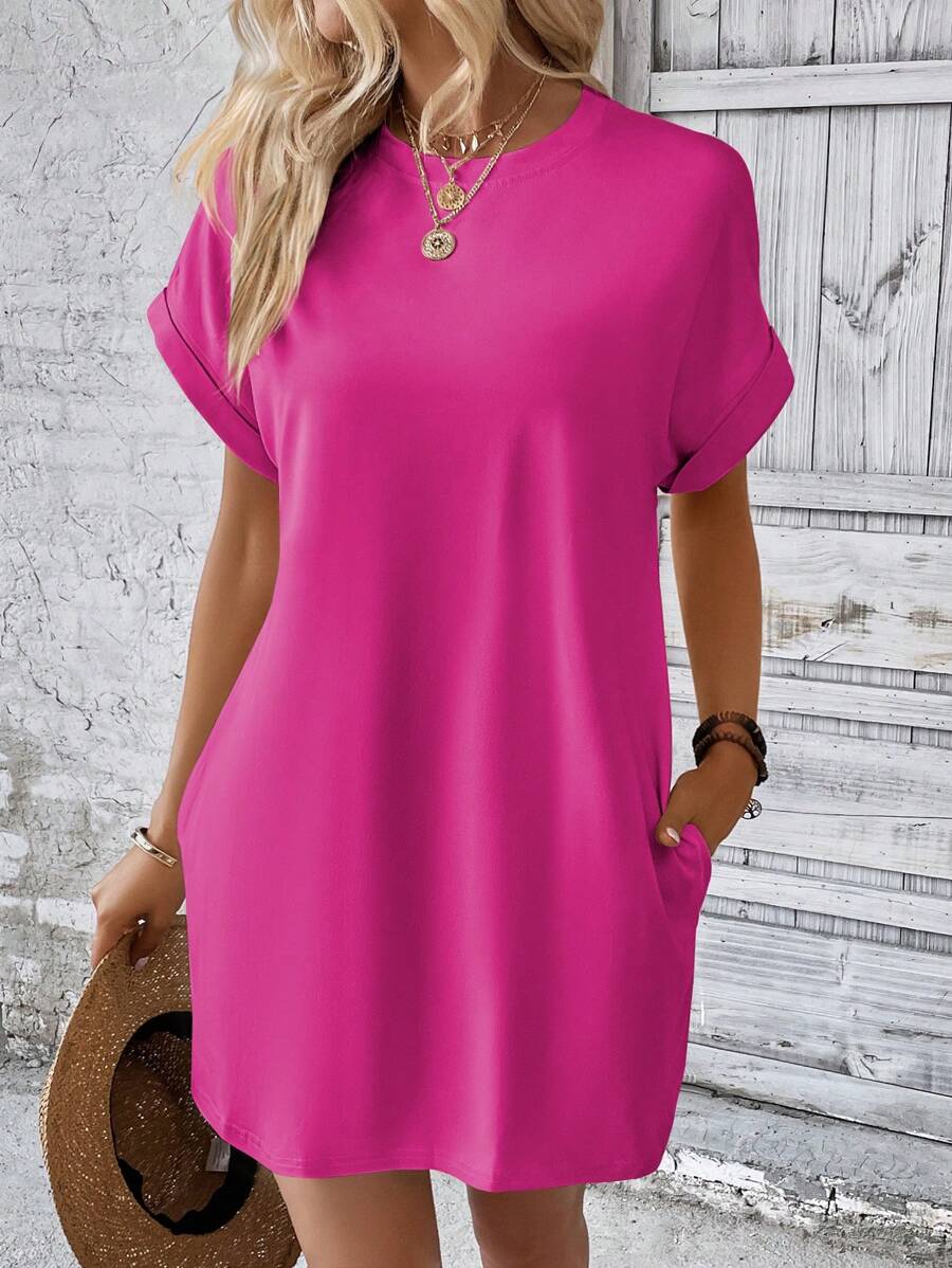 Vestido Curto Camiseta com Bolsos e Manga Morcego - La Lecce