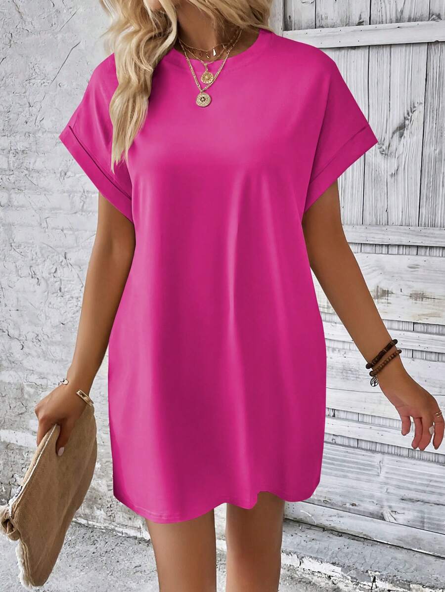 Vestido Curto Camiseta com Bolsos e Manga Morcego - La Lecce