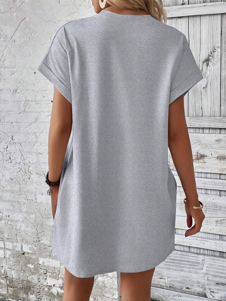 Vestido Curto Camiseta com Bolsos e Manga Morcego - La Lecce