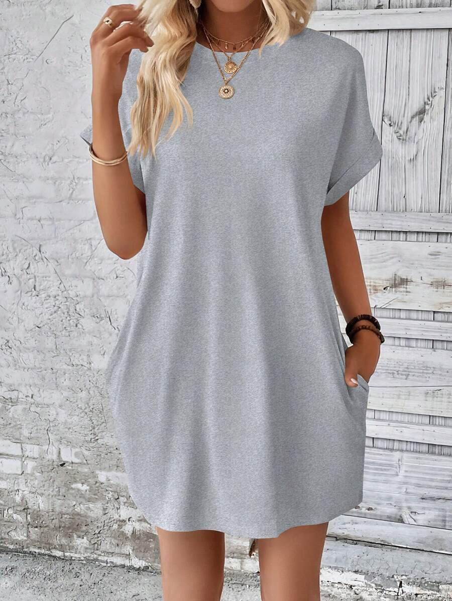 Vestido Curto Camiseta com Bolsos e Manga Morcego - La Lecce