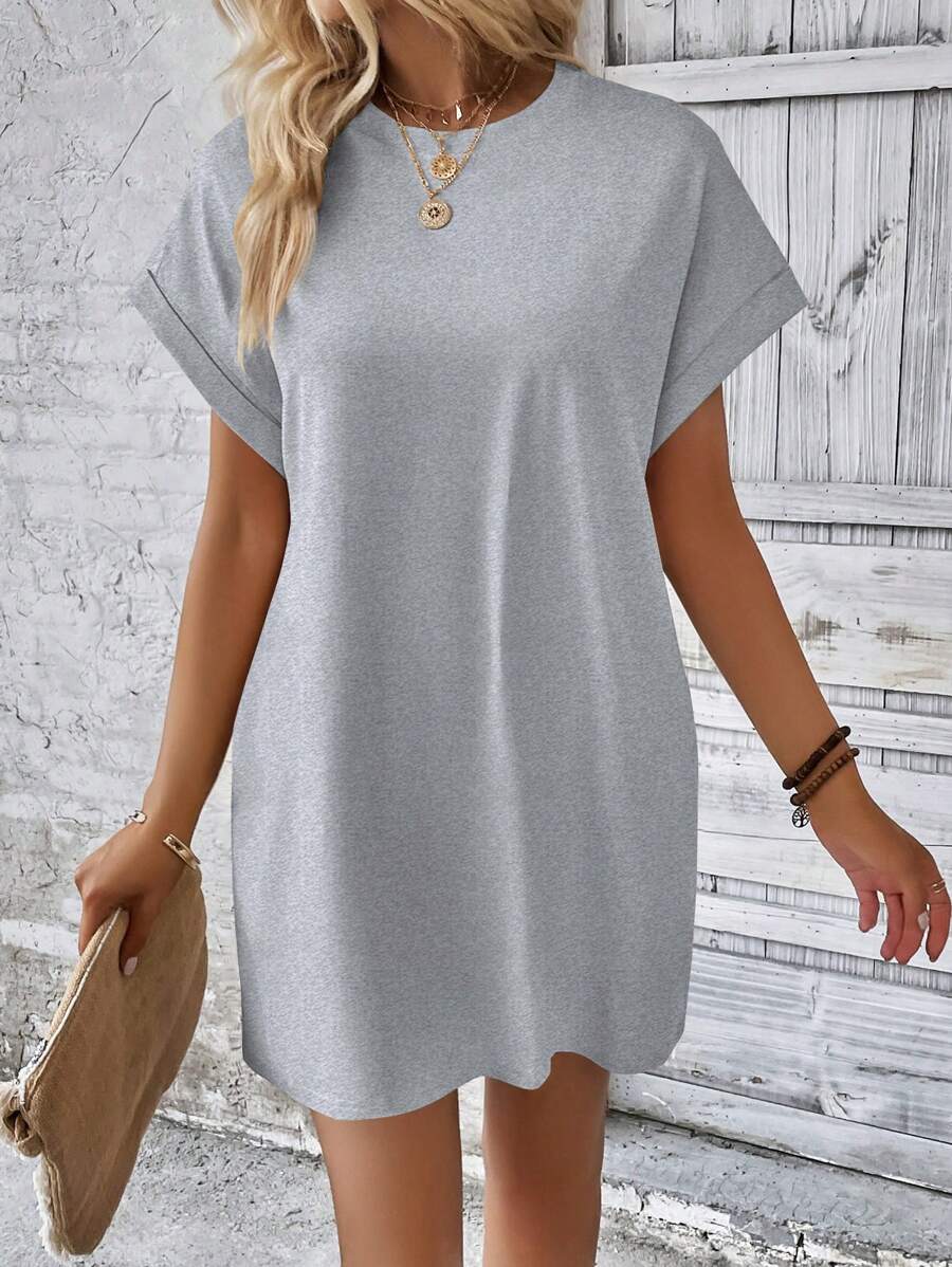 Vestido Curto Camiseta com Bolsos e Manga Morcego - La Lecce