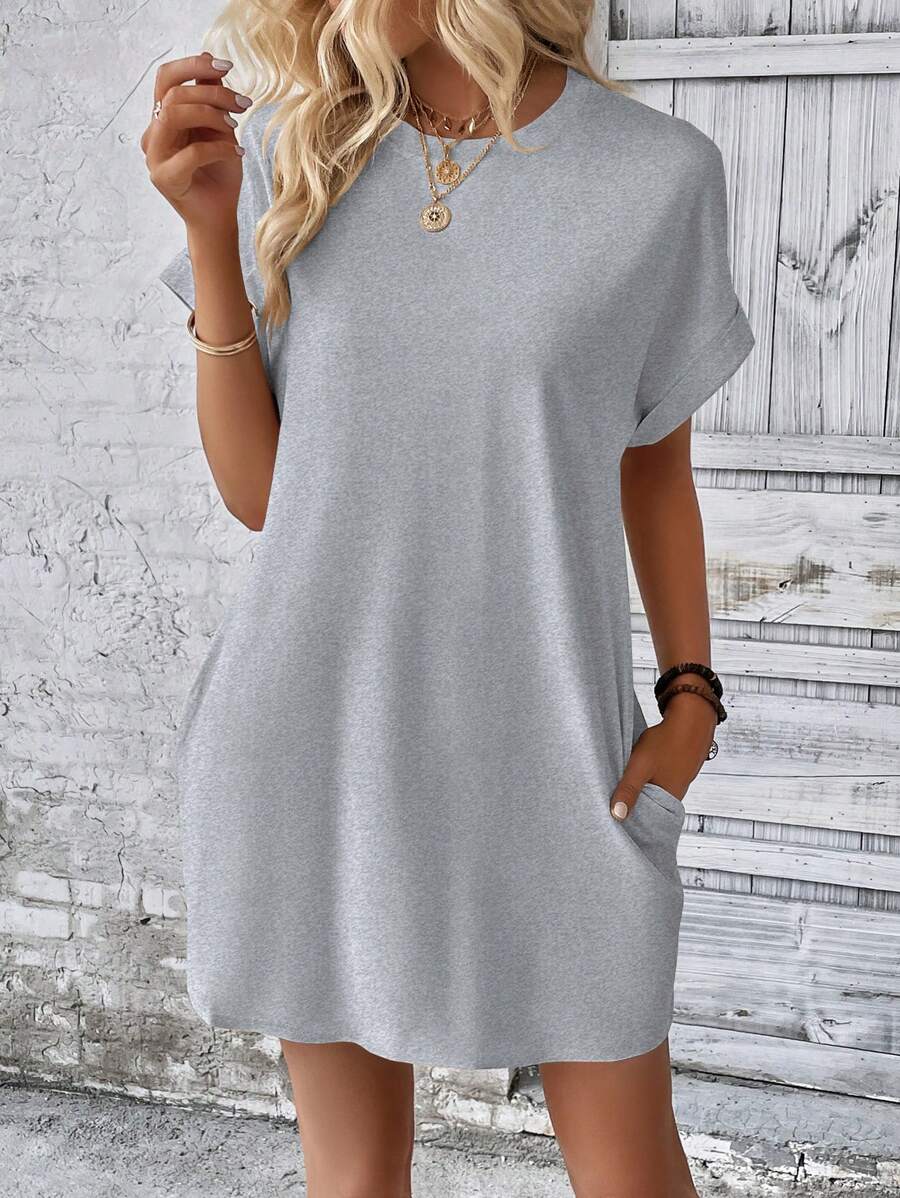 Vestido Curto Camiseta com Bolsos e Manga Morcego - La Lecce