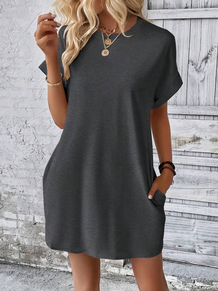Vestido Curto Camiseta com Bolsos e Manga Morcego - La Lecce