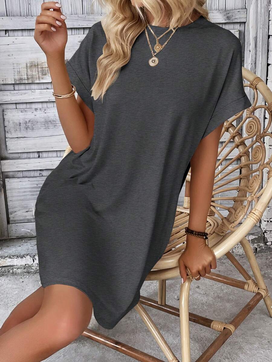 Vestido Curto Camiseta com Bolsos e Manga Morcego - La Lecce