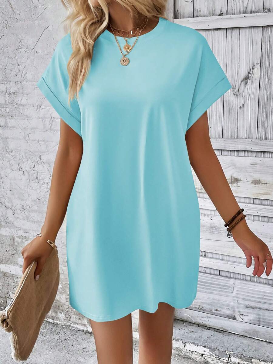 Vestido Curto Camiseta com Bolsos e Manga Morcego - La Lecce