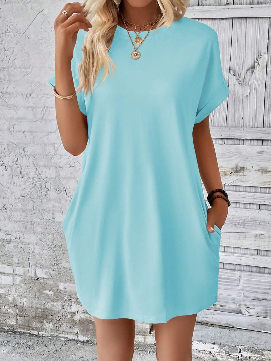 Vestido Curto Camiseta com Bolsos e Manga Morcego - La Lecce