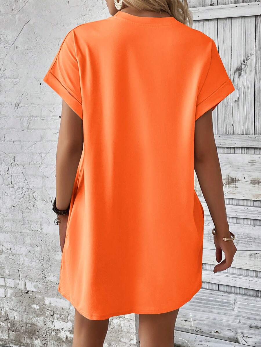 Vestido Curto Camiseta com Bolsos e Manga Morcego - La Lecce