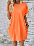 Vestido Curto Camiseta com Bolsos e Manga Morcego - La Lecce