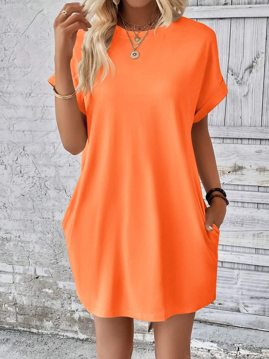 Vestido Curto Camiseta com Bolsos e Manga Morcego - La Lecce