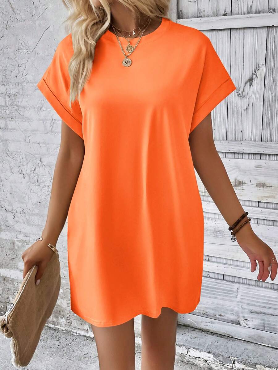 Vestido Curto Camiseta com Bolsos e Manga Morcego - La Lecce