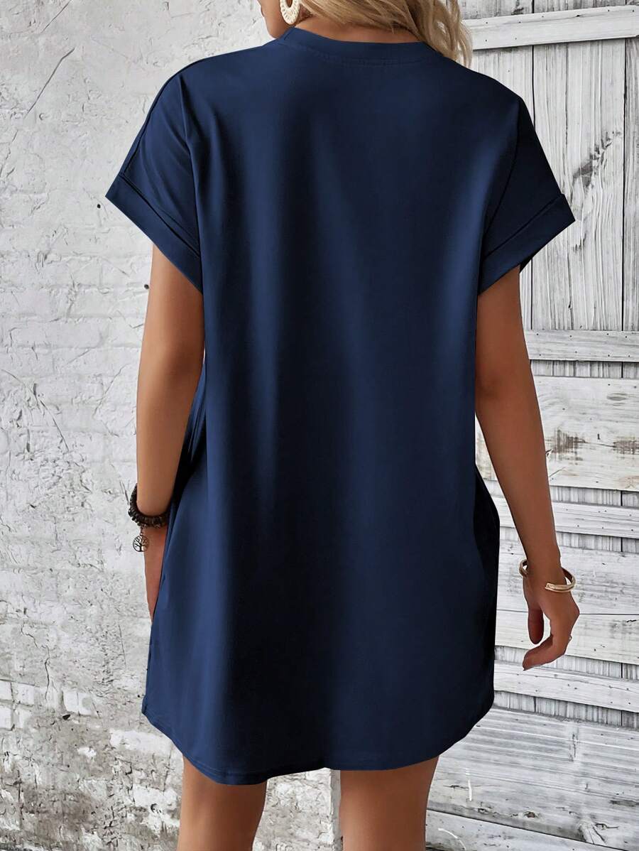 Vestido Curto Camiseta com Bolsos e Manga Morcego - La Lecce