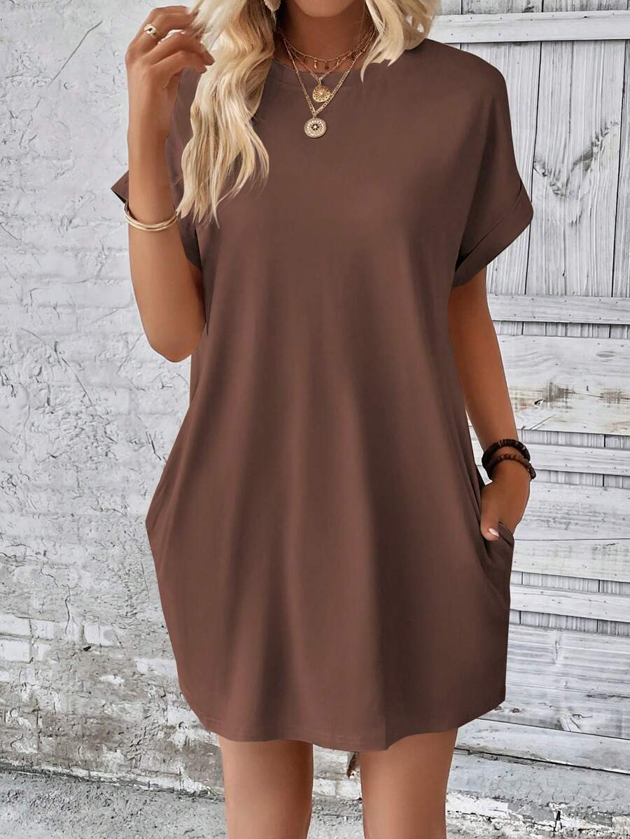 Vestido Curto Camiseta com Bolsos e Manga Morcego - La Lecce