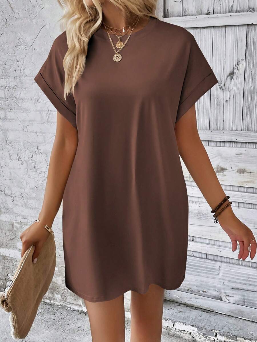 Vestido Curto Camiseta com Bolsos e Manga Morcego - La Lecce