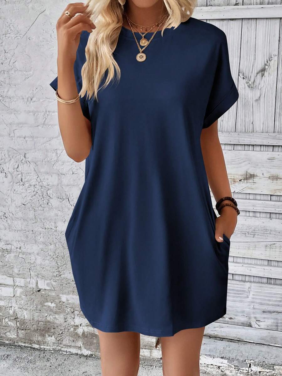 Vestido Curto Camiseta com Bolsos e Manga Morcego - La Lecce
