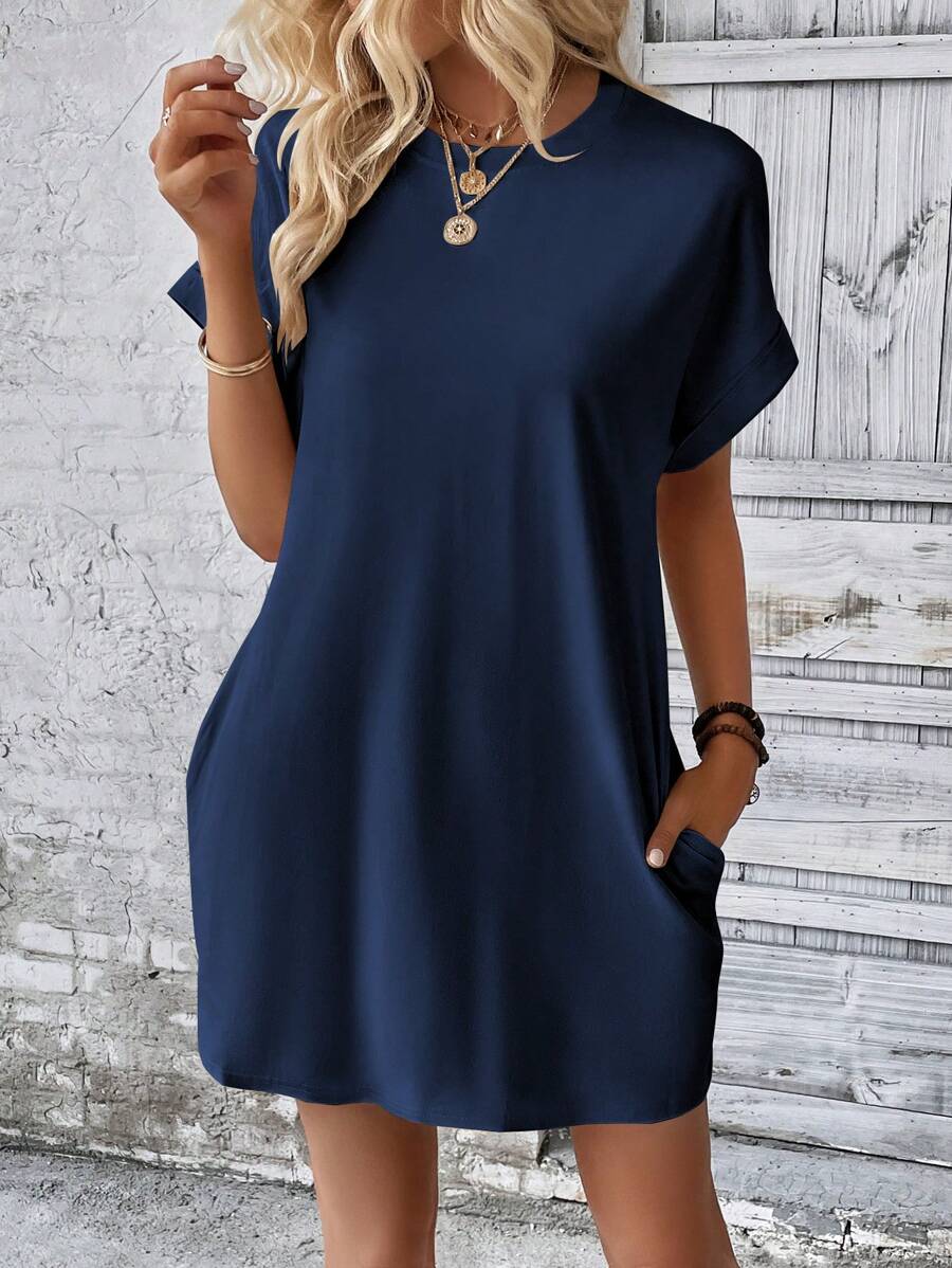 Vestido Curto Camiseta com Bolsos e Manga Morcego - La Lecce