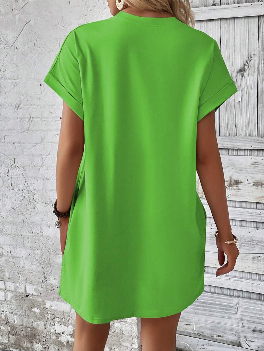 Vestido Curto Camiseta com Bolsos e Manga Morcego - La Lecce