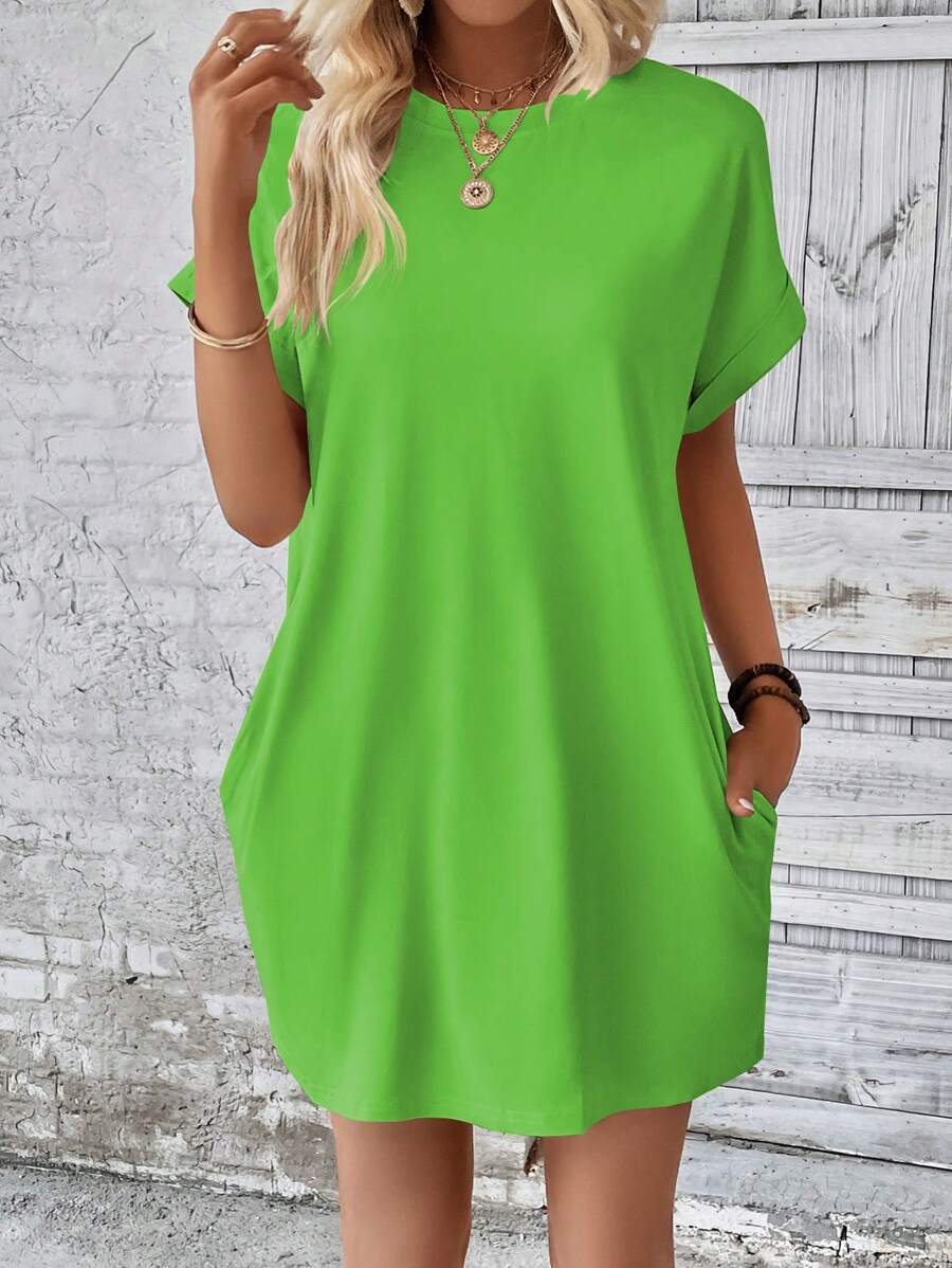 Vestido Curto Camiseta com Bolsos e Manga Morcego - La Lecce