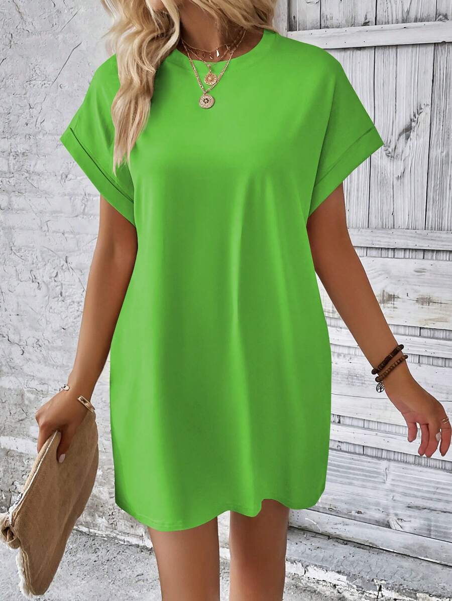 Vestido Curto Camiseta com Bolsos e Manga Morcego - La Lecce
