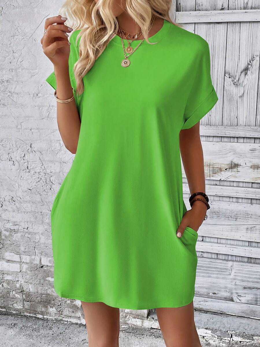 Vestido Curto Camiseta com Bolsos e Manga Morcego - La Lecce